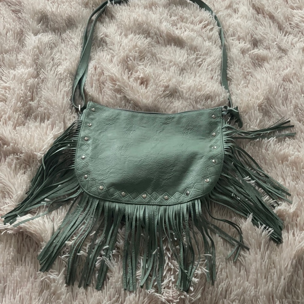 Boho studded fringe bag.